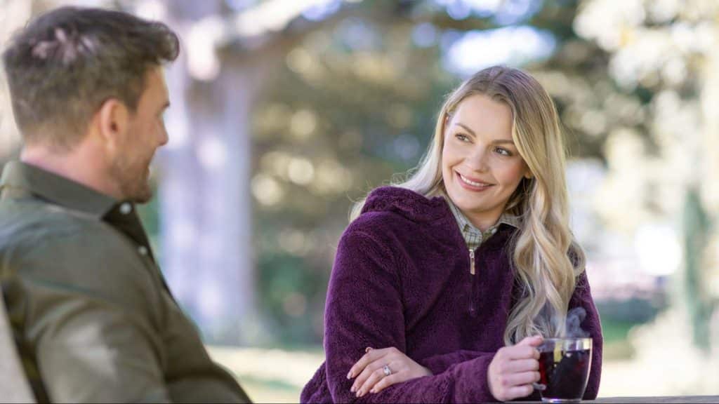 A man and woman smiling to each other