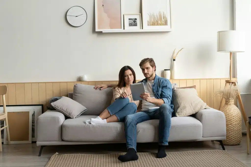 couple serious living room