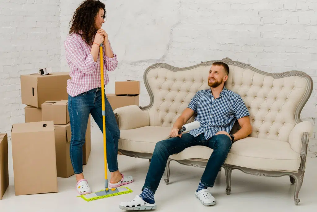 Woman holding a floor wiper