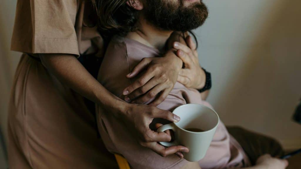 A person hugging their partner