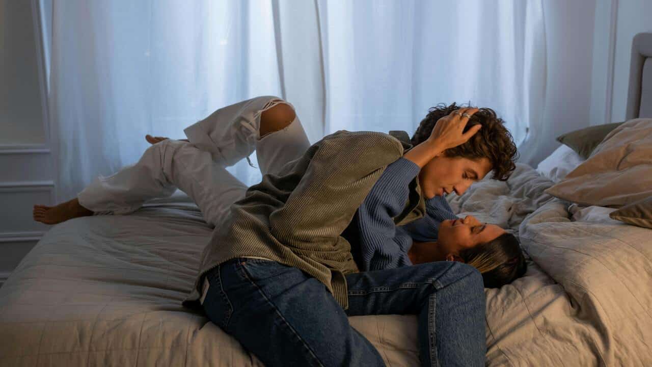 A couple in bed together