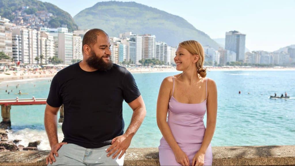 A man and woman looking at each other