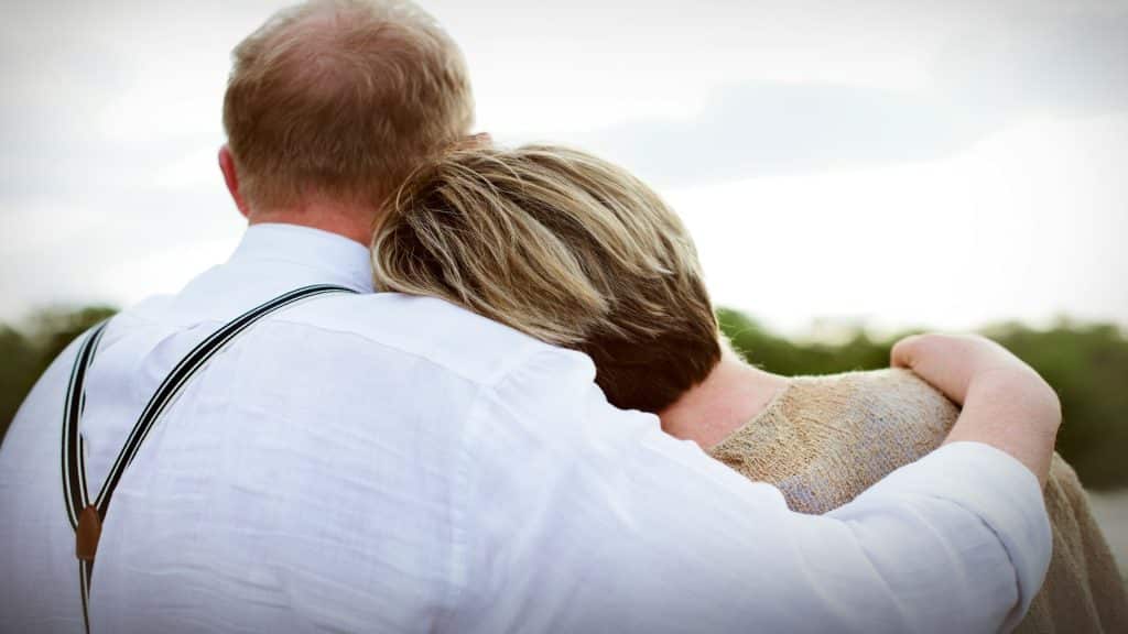 couple comforting each other