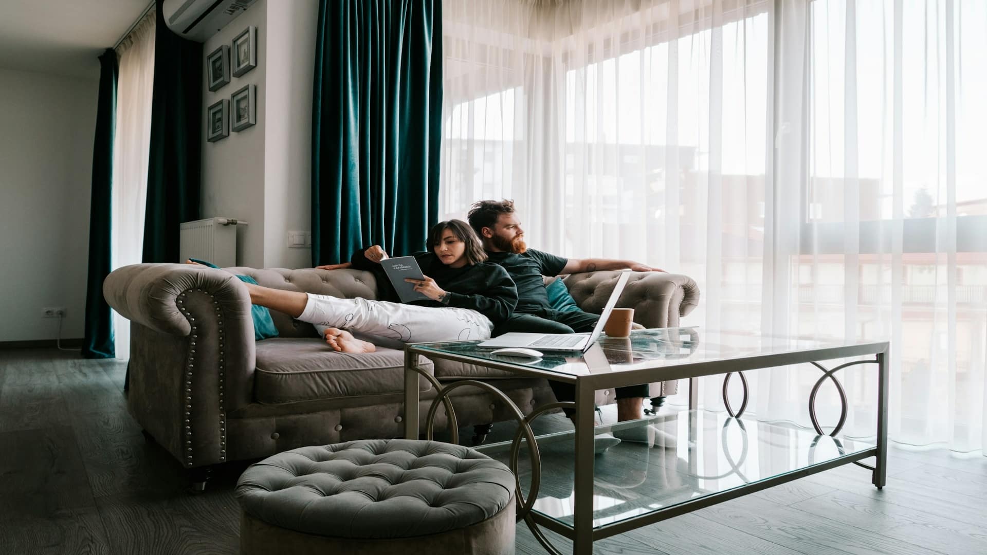 couple sitting quietly together on couch