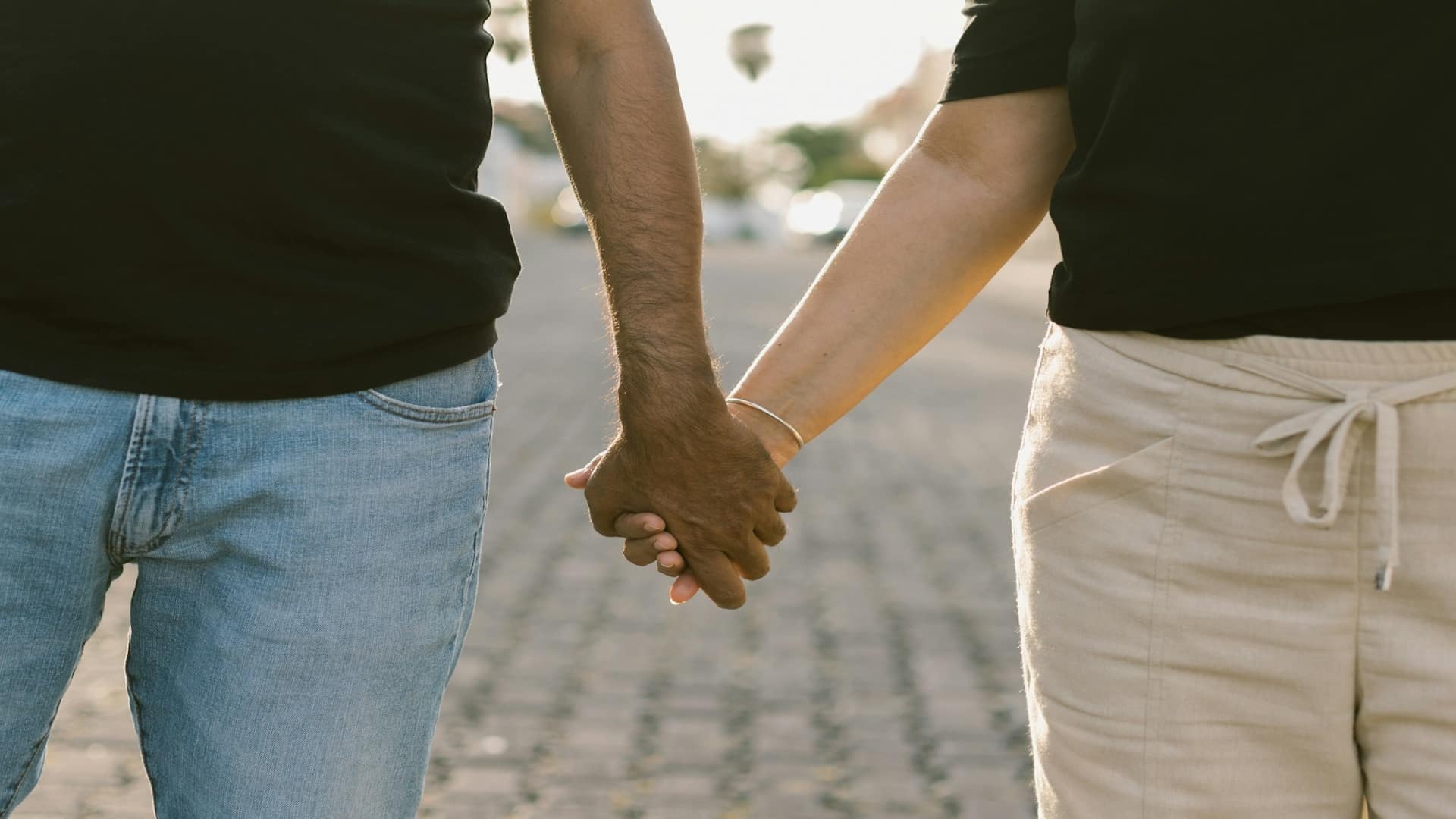 couple holding hands together