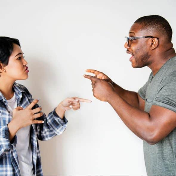 A man and woman arguing