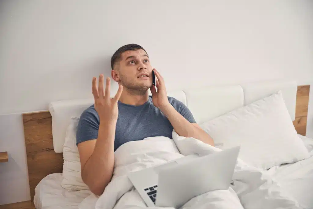 stressed man on phone