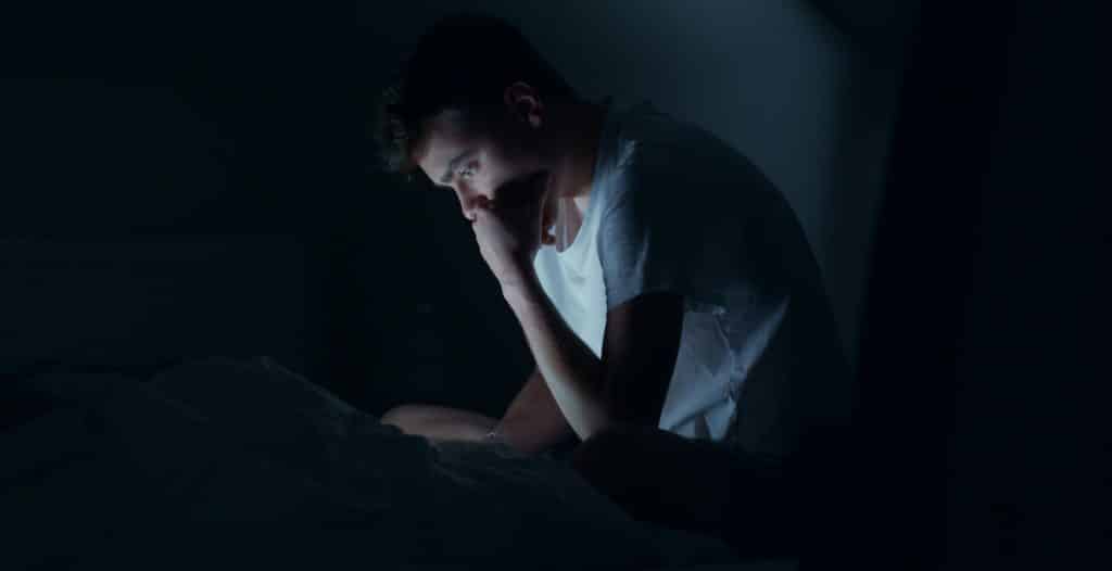 stressed man at night