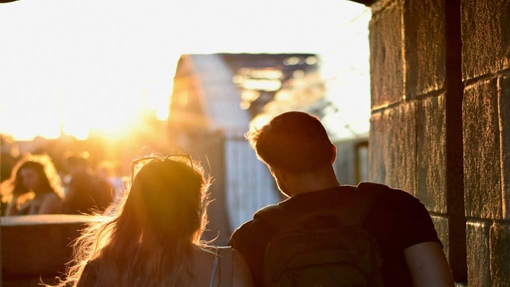 couple watching sunset together