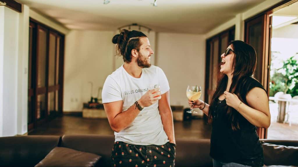 A man and woman laughing 