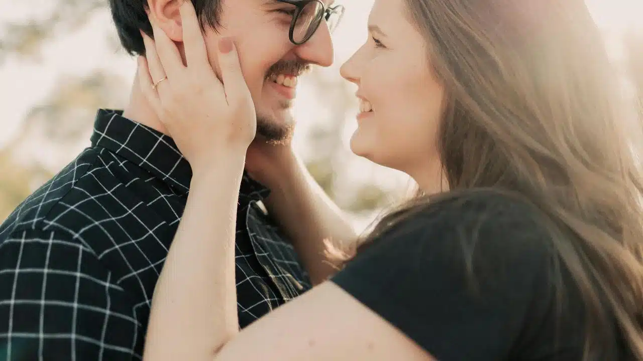 A couple smiling closely