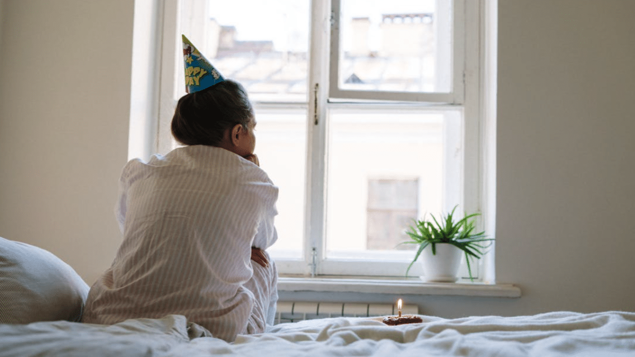 A woman looking lonely on her birthday