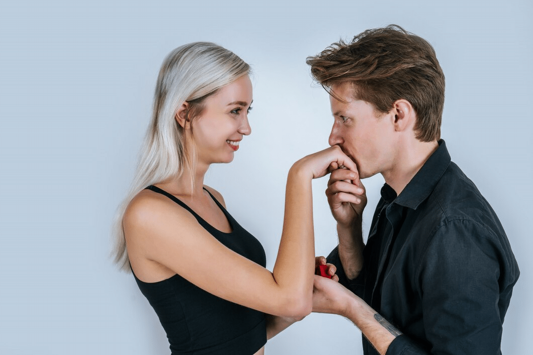 Happy portrait of a couple in surprise