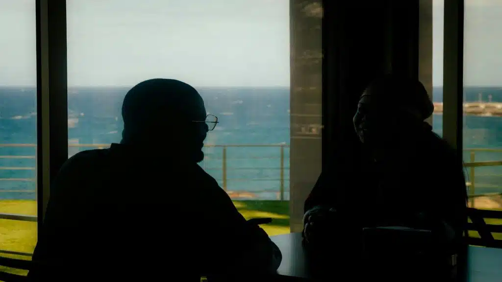 couple talking calmly at table