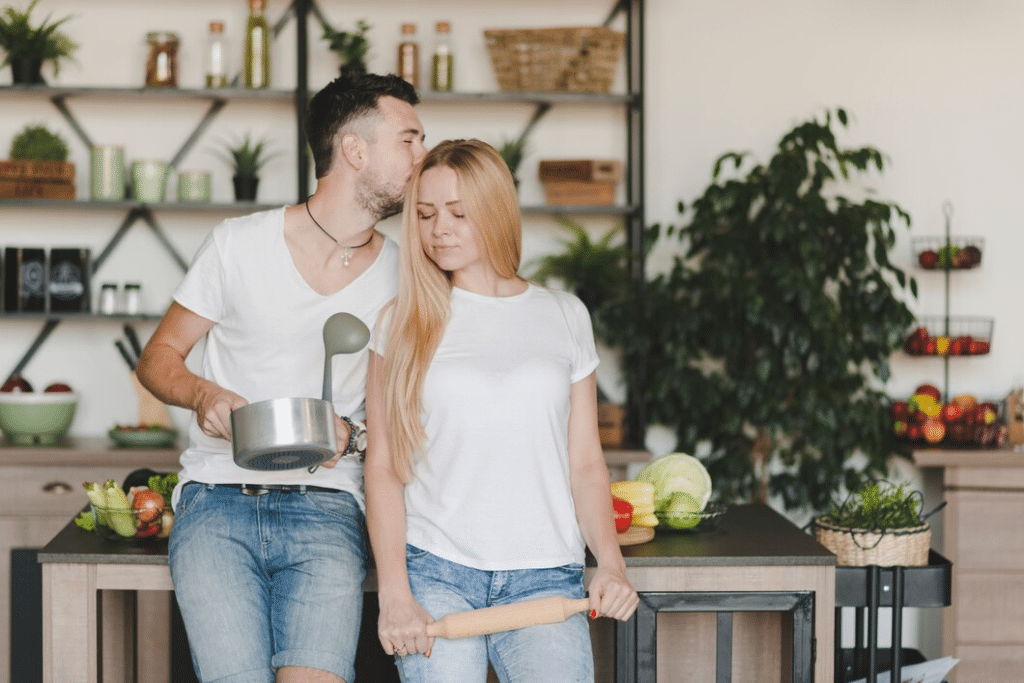 Young happy couple in the kitchen