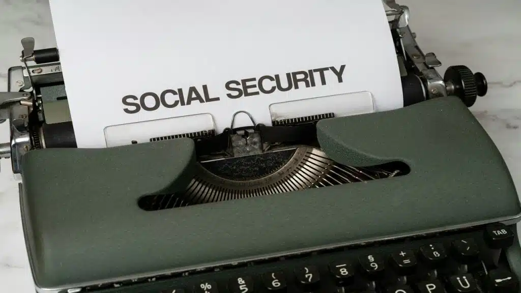 Paper with the words “social security” typewritten on it