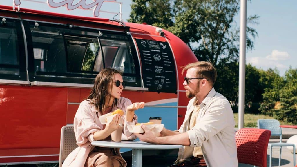 A couple enjoying food and coffee 