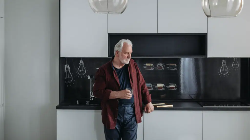 A man looking sad at home