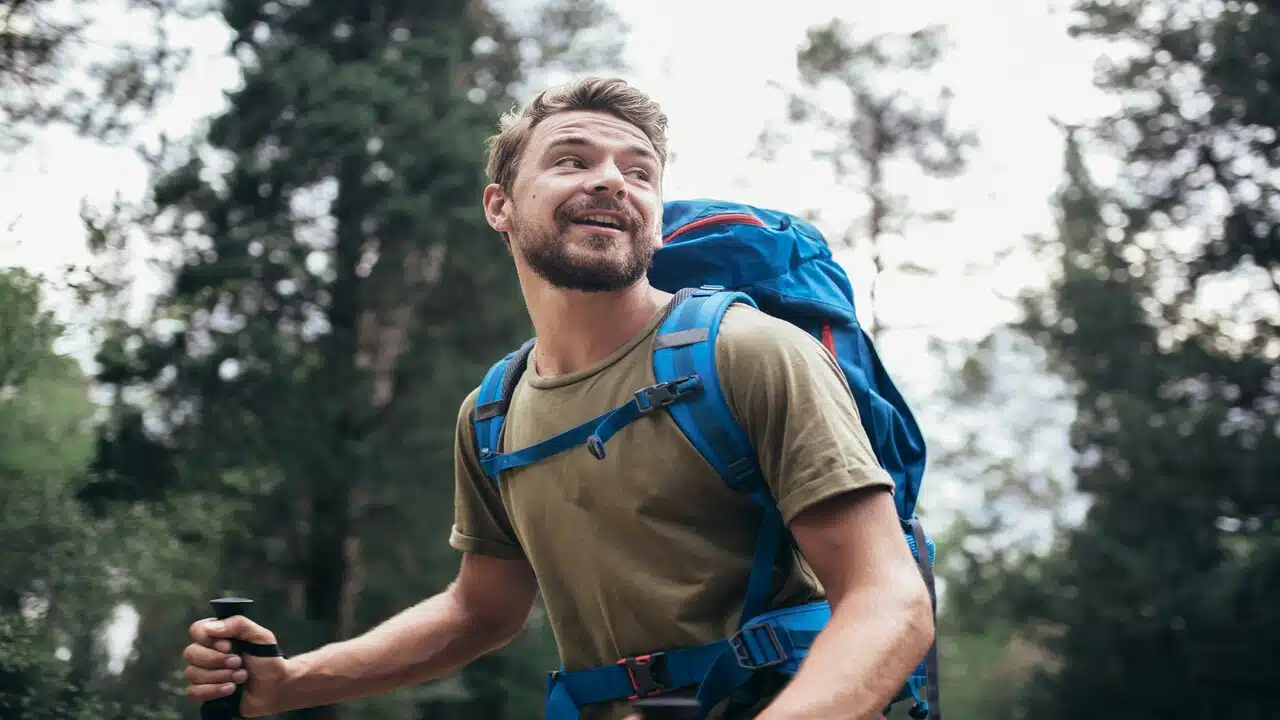 A man hiking in the woods