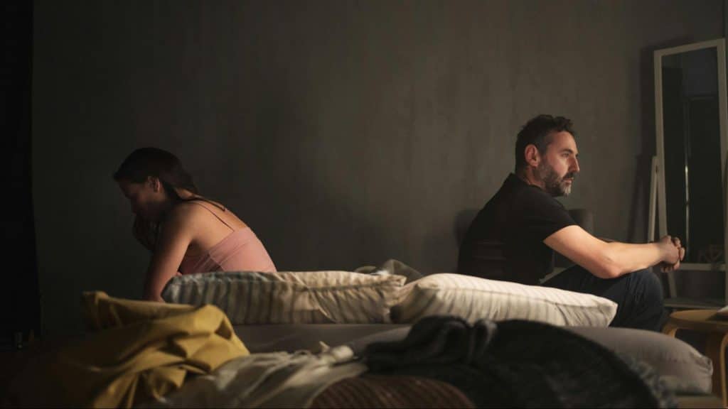A man and woman not talking to each other