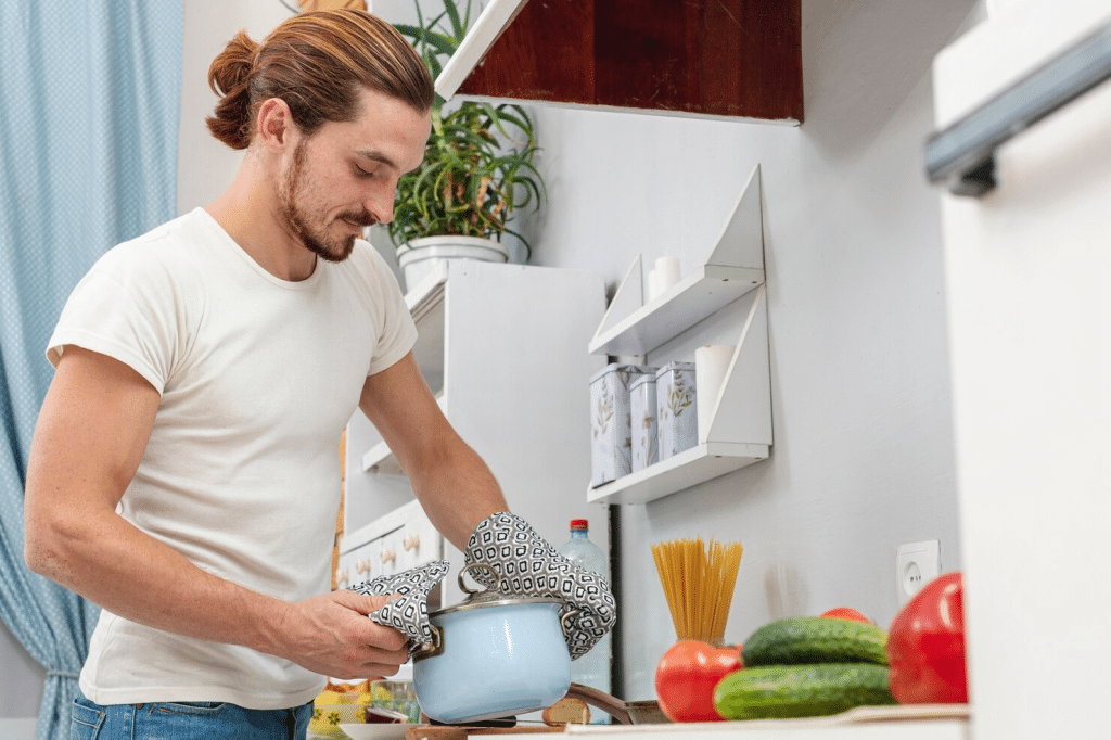 A man cooking for his wife