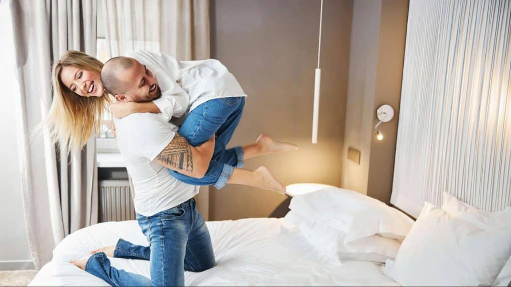 Man carrying a woman