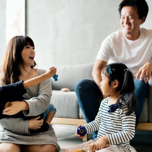 A happy family spending time at home together.