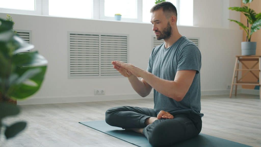 person practicing calm breathing