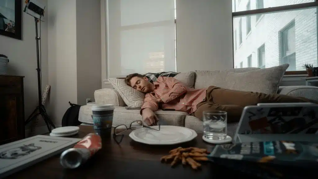 A man sleeping on the couch