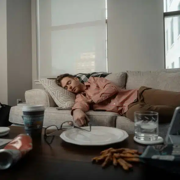 A man sleeping on the couch