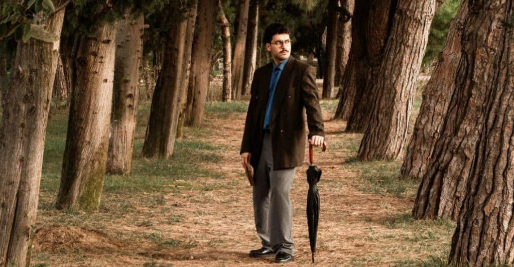 man walking alone park