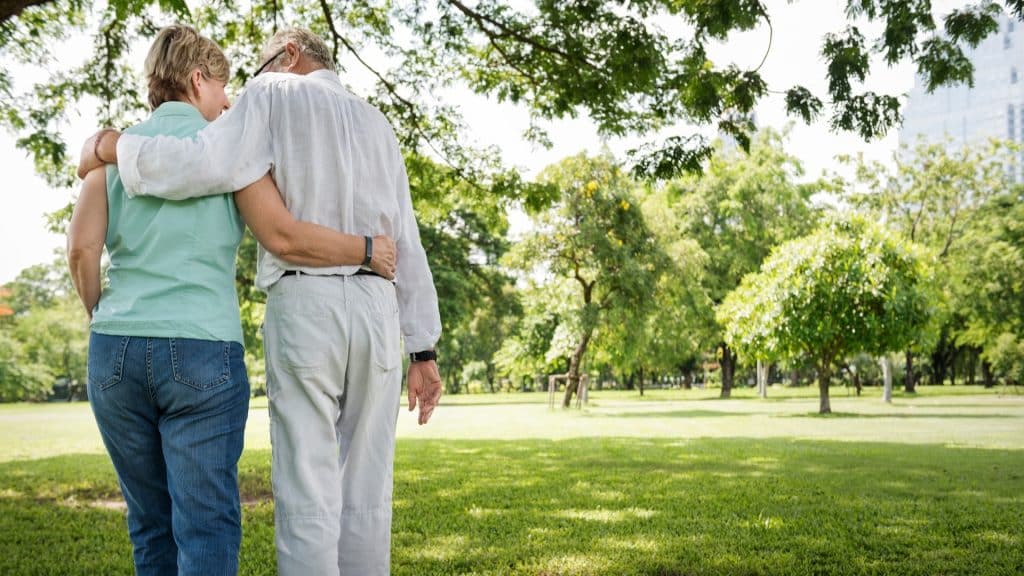couple walking together in park