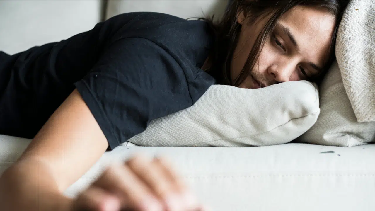 A woman sleeping on the couch