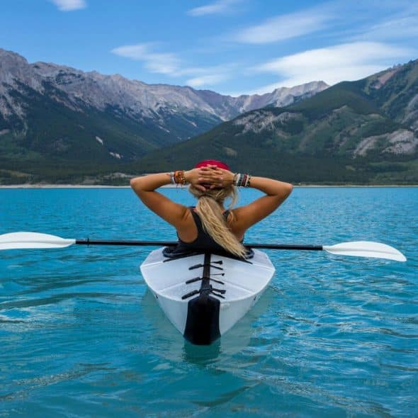 A woman kayaking by herself