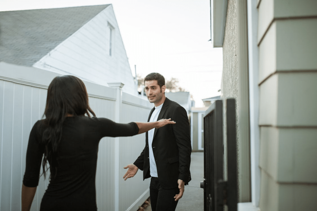 Couple having argument outdoors