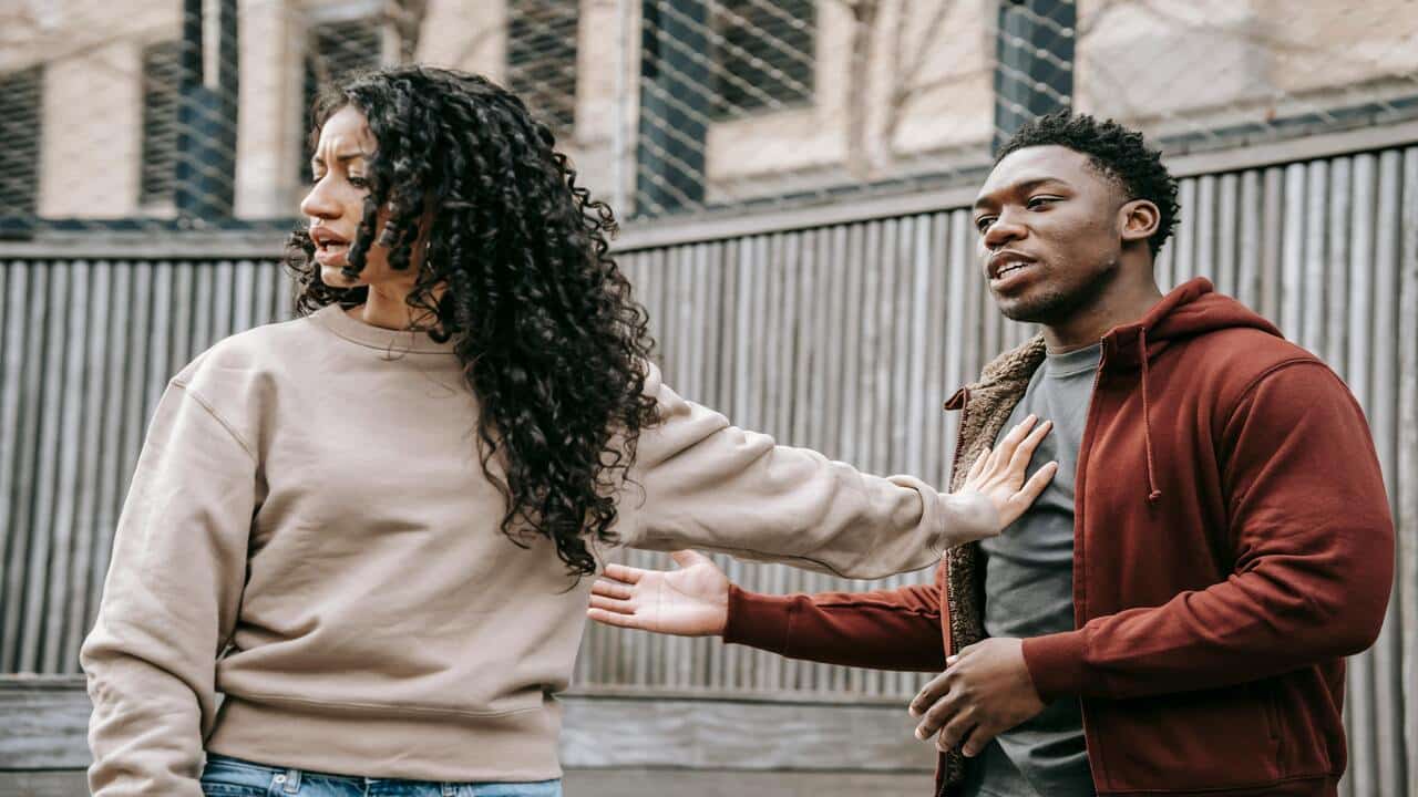 A couple fighting in public