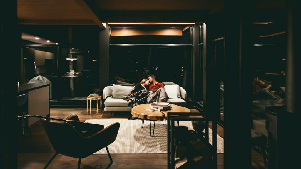 couple talking comfortably indoors