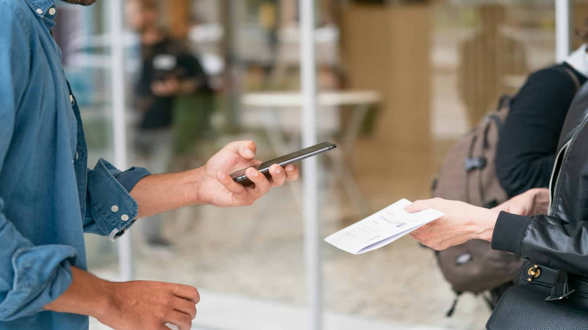 man reviewing credit card statements