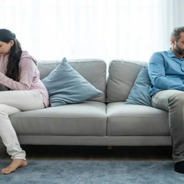 A couple busy with their phones