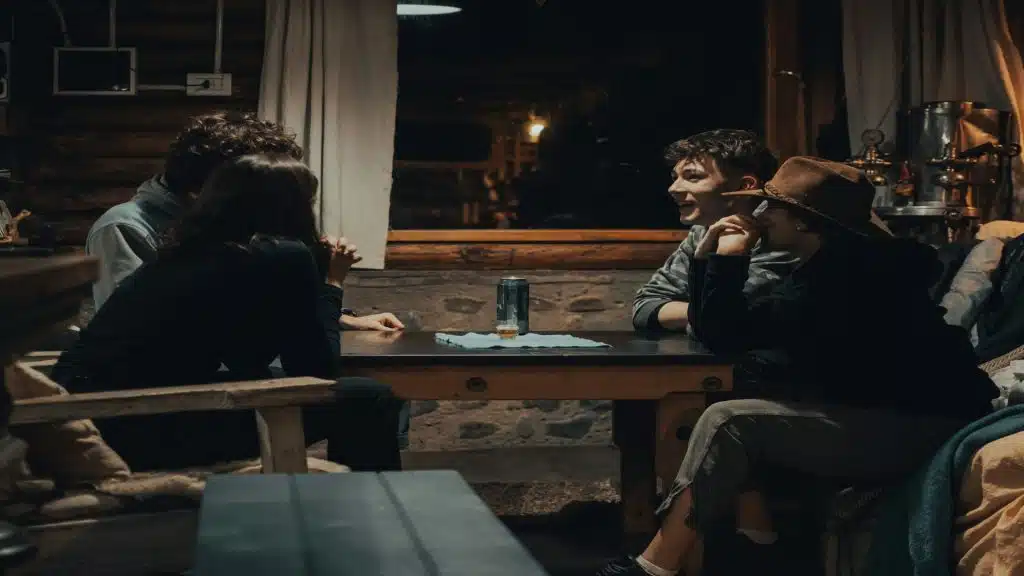 couple talking with friends at gathering