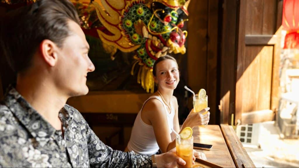 A man and woman smiling at each other