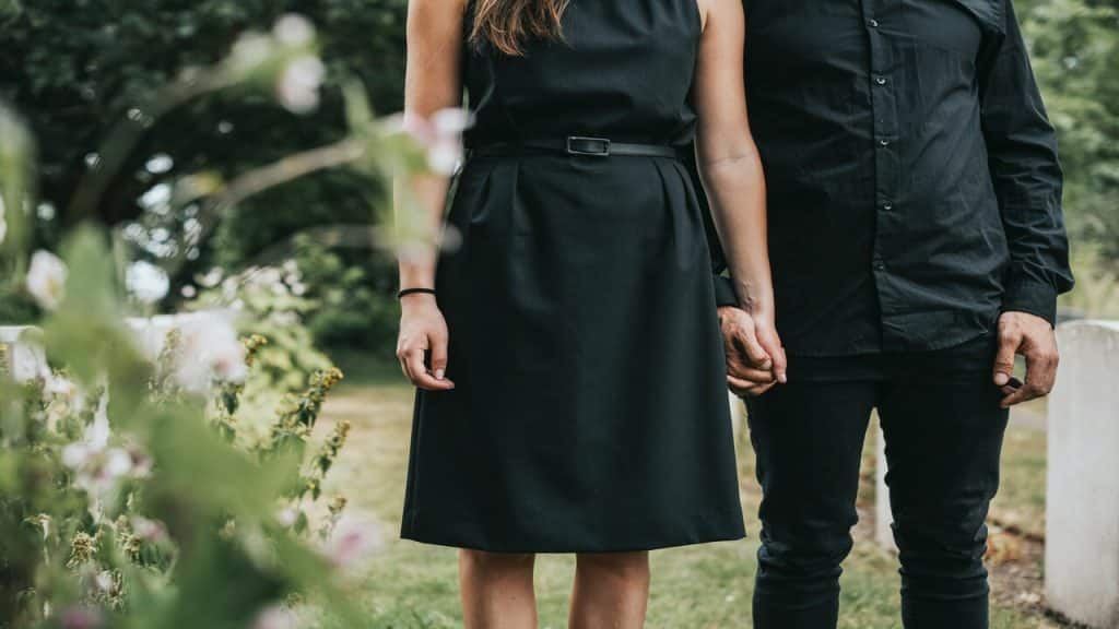 A couple at a funeral 