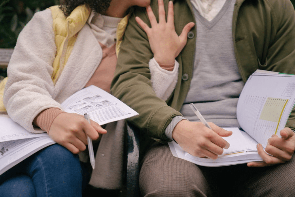 Young couple writing together