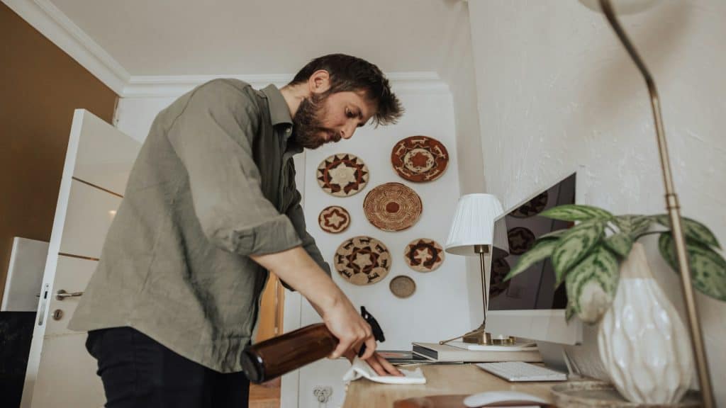 man relaxing in organized home