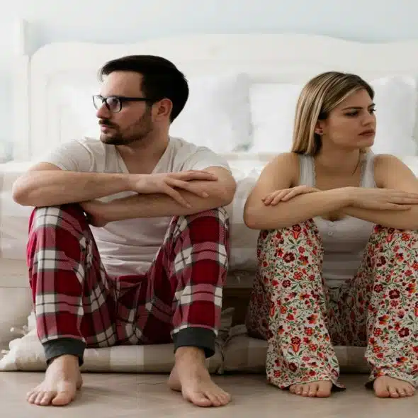 A couple refusing to look at each other