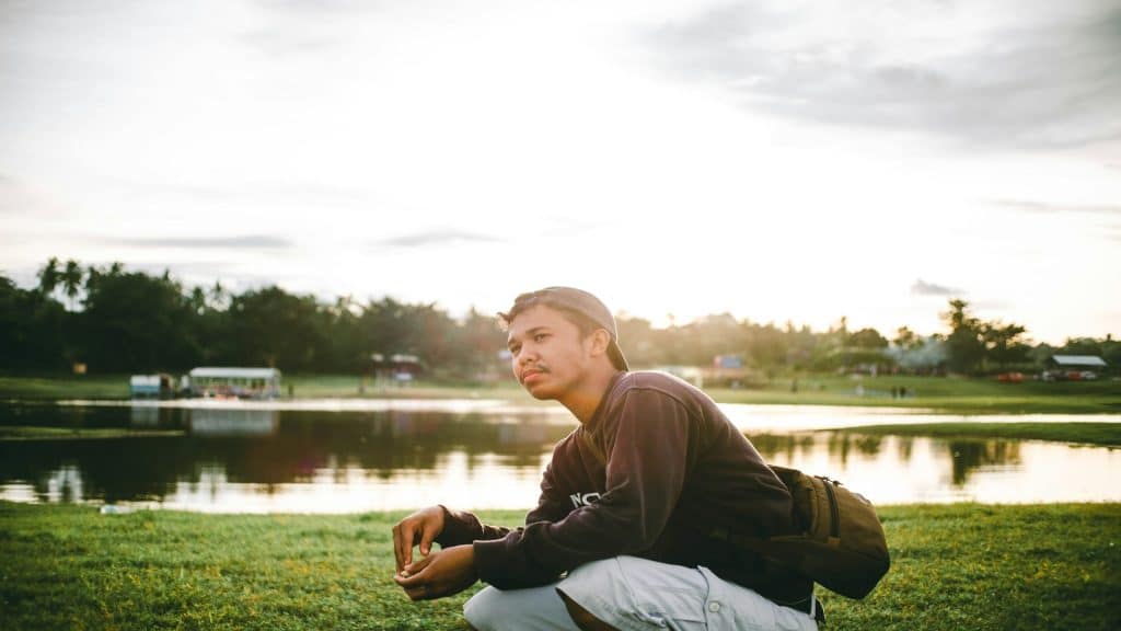 man sitting quietly reflecting