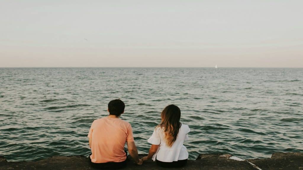 couple sitting apart quietly