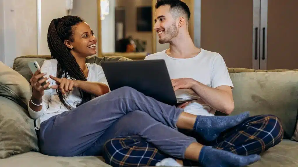 A couple sitting on a couch