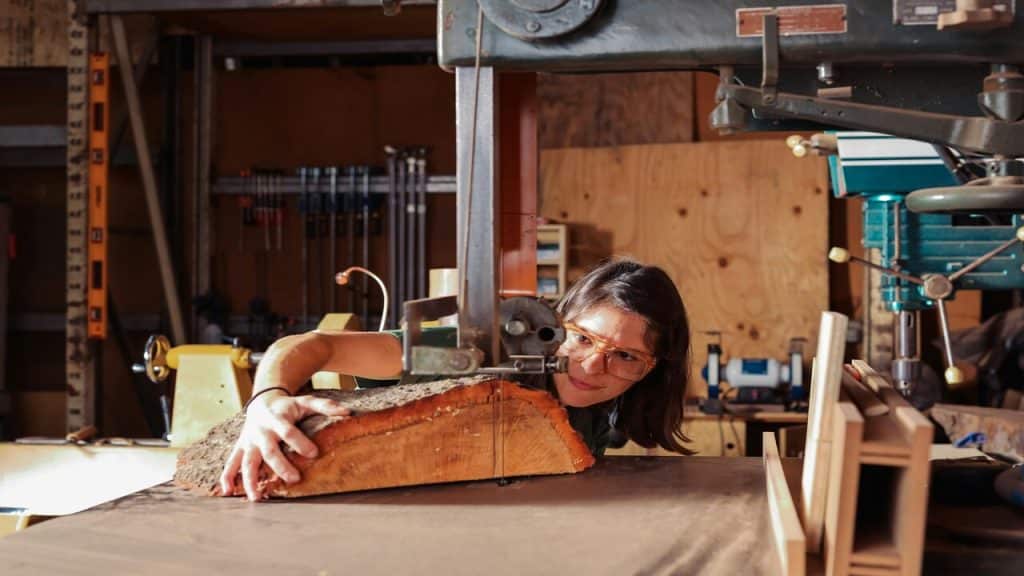 A woman doing some woodworking