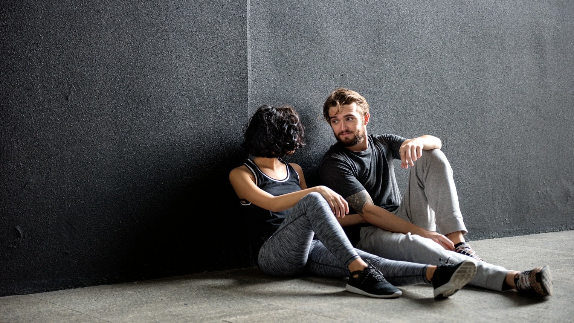 couple having serious conversation indoors